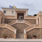 Explore this neoclassical architecture in Kalamata, Greece featuring stone and stucco design.